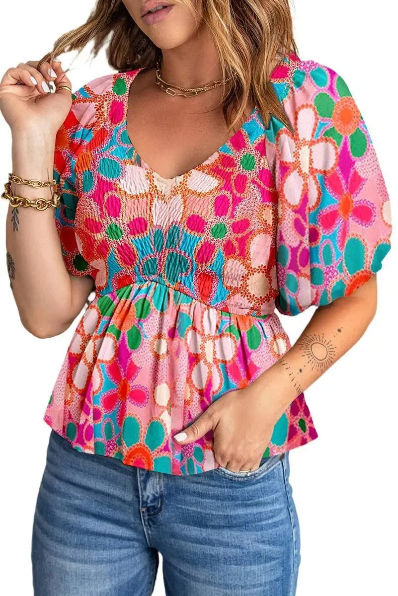 Fall in love with our Flower Print Puff Sleeve Peplum Top - Shop Now!