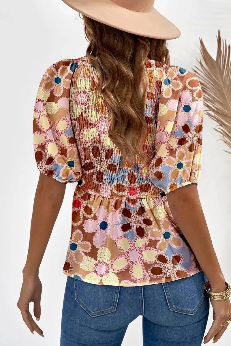 Fall in love with our Flower Print Puff Sleeve Peplum Top - Shop Now!